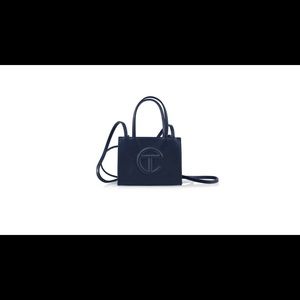 Small navy blue Telfar purse. Free shipping.